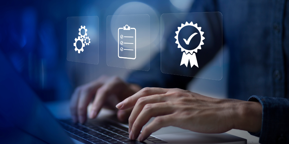 Hands typing on a laptop with digital icons for automated processes, compliance checks, and Cyber Essentials certification, symbolising cybersecurity best practices.